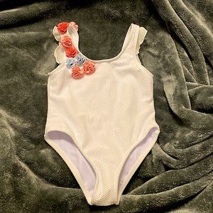 Swimsuit,brand new runs small it’s size 6 but definitely will fit a 4 -5 t